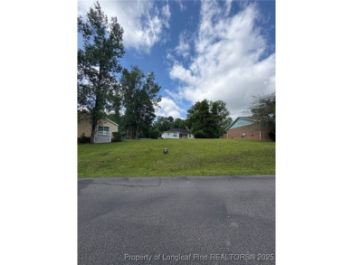 Build your low-maintenance dream home on this level, 0.11-acre on Carolina Trace Country Club in North Carolina - for sale on GolfHomes.com, golf home, golf lot