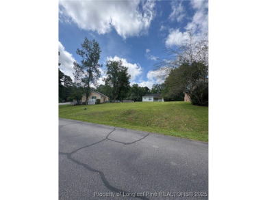 Build your low-maintenance dream home on this level, 0.11-acre on Carolina Trace Country Club in North Carolina - for sale on GolfHomes.com, golf home, golf lot