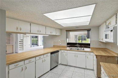 Welcome to this charming and spacious 3-bedroom, 3-bathroom home on Plantation Inn and Golf Resort  in Florida - for sale on GolfHomes.com, golf home, golf lot
