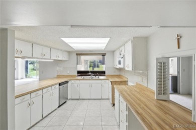 Welcome to this charming and spacious 3-bedroom, 3-bathroom home on Plantation Inn and Golf Resort  in Florida - for sale on GolfHomes.com, golf home, golf lot