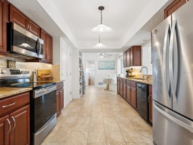 Motivated Sellers! Welcome home to this Spanish on Gulf Gate Golf Club in Florida - for sale on GolfHomes.com, golf home, golf lot