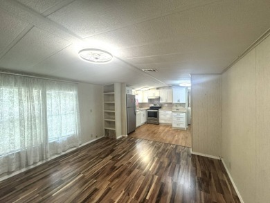 Nicely updated home with newer kitchen appliances, washer/dryer on Golden Lakes Golf Course in Florida - for sale on GolfHomes.com, golf home, golf lot