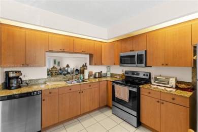 BEAUTIFUL 2 BEDROOMS 2 BATHROOMS LARGE UNIT OVERLOOKING A G0LG on Flamingo Lakes Country Club in Florida - for sale on GolfHomes.com, golf home, golf lot