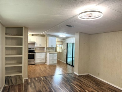 Nicely updated home with newer kitchen appliances, washer/dryer on Golden Lakes Golf Course in Florida - for sale on GolfHomes.com, golf home, golf lot