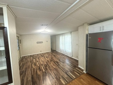 Nicely updated home with newer kitchen appliances, washer/dryer on Golden Lakes Golf Course in Florida - for sale on GolfHomes.com, golf home, golf lot