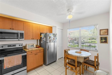BEAUTIFUL 2 BEDROOMS 2 BATHROOMS LARGE UNIT OVERLOOKING A G0LG on Flamingo Lakes Country Club in Florida - for sale on GolfHomes.com, golf home, golf lot