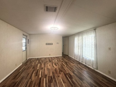 Nicely updated home with newer kitchen appliances, washer/dryer on Golden Lakes Golf Course in Florida - for sale on GolfHomes.com, golf home, golf lot