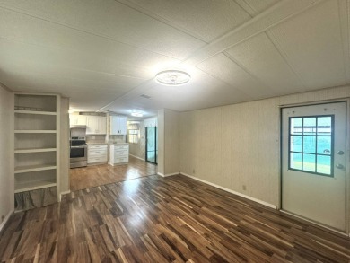 Nicely updated home with newer kitchen appliances, washer/dryer on Golden Lakes Golf Course in Florida - for sale on GolfHomes.com, golf home, golf lot