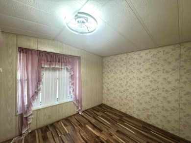 Nicely updated home with newer kitchen appliances, washer/dryer on Golden Lakes Golf Course in Florida - for sale on GolfHomes.com, golf home, golf lot