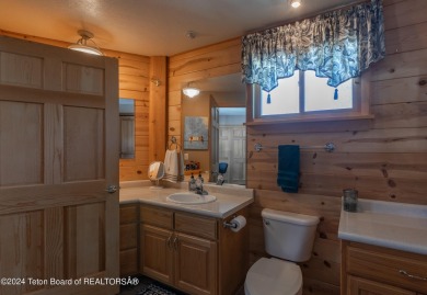 This turn-key home on Star Valley Ranch has been remodeled, and on Cedar Creek Golf Course in Wyoming - for sale on GolfHomes.com, golf home, golf lot