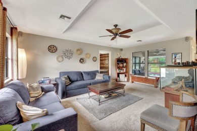 Charming pool home in Papaya Village on a rare 3/4 acre homesite on Eagle Wood Golf Course in Florida - for sale on GolfHomes.com, golf home, golf lot