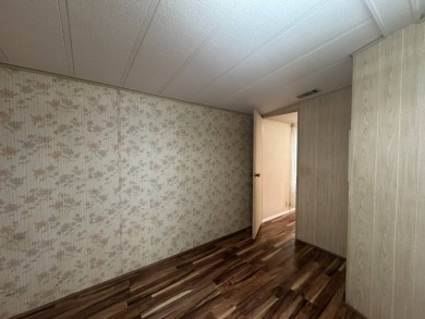Nicely updated home with newer kitchen appliances, washer/dryer on Golden Lakes Golf Course in Florida - for sale on GolfHomes.com, golf home, golf lot
