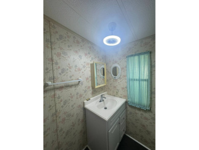 Nicely updated home with newer kitchen appliances, washer/dryer on Golden Lakes Golf Course in Florida - for sale on GolfHomes.com, golf home, golf lot