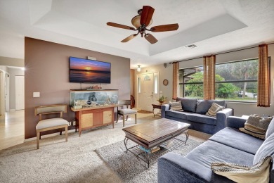 Charming pool home in Papaya Village on a rare 3/4 acre homesite on Eagle Wood Golf Course in Florida - for sale on GolfHomes.com, golf home, golf lot