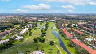 BEAUTIFUL 2 BEDROOMS 2 BATHROOMS LARGE UNIT OVERLOOKING A G0LG on Flamingo Lakes Country Club in Florida - for sale on GolfHomes.com, golf home, golf lot