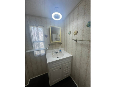 Nicely updated home with newer kitchen appliances, washer/dryer on Golden Lakes Golf Course in Florida - for sale on GolfHomes.com, golf home, golf lot