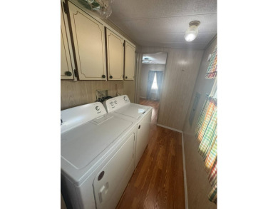 Nicely updated home with newer kitchen appliances, washer/dryer on Golden Lakes Golf Course in Florida - for sale on GolfHomes.com, golf home, golf lot