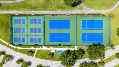 BEAUTIFUL 2 BEDROOMS 2 BATHROOMS LARGE UNIT OVERLOOKING A G0LG on Flamingo Lakes Country Club in Florida - for sale on GolfHomes.com, golf home, golf lot