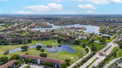 BEAUTIFUL 2 BEDROOMS 2 BATHROOMS LARGE UNIT OVERLOOKING A G0LG on Flamingo Lakes Country Club in Florida - for sale on GolfHomes.com, golf home, golf lot