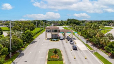 BEAUTIFUL 2 BEDROOMS 2 BATHROOMS LARGE UNIT OVERLOOKING A G0LG on Flamingo Lakes Country Club in Florida - for sale on GolfHomes.com, golf home, golf lot