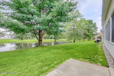 Framed by shimmering water views and lush fairways, this on Westlake Golf and Country Club in New Jersey - for sale on GolfHomes.com, golf home, golf lot