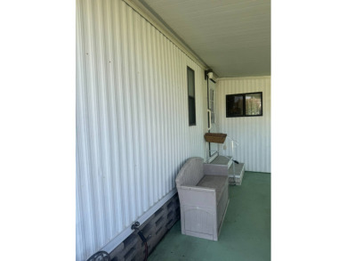 Nicely updated home with newer kitchen appliances, washer/dryer on Golden Lakes Golf Course in Florida - for sale on GolfHomes.com, golf home, golf lot