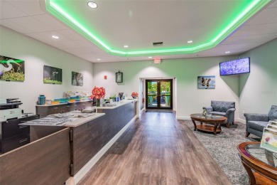 SUPER STRATFORD V MODEL HOME WITH A PRIVATE SETTING IN A on Heritage Pines Country Club in Florida - for sale on GolfHomes.com, golf home, golf lot