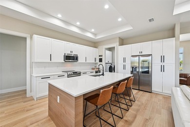 Sunsets, pond and golf course views become part of everyday life on Pinemoor West Golf Club in Florida - for sale on GolfHomes.com, golf home, golf lot