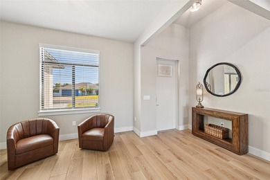 Sunsets, pond and golf course views become part of everyday life on Pinemoor West Golf Club in Florida - for sale on GolfHomes.com, golf home, golf lot