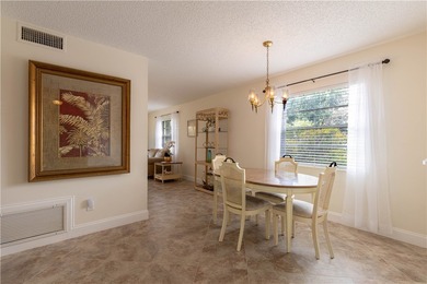 Beautifully maintained private corner unit w/gorgeous views of on Vero Beach South Golf Course in Florida - for sale on GolfHomes.com, golf home, golf lot