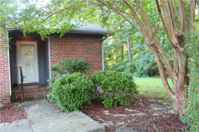 Welcome to this 2-bedroom, 2-bathroom townhome located right on on Kings Grant Golf and Country Club in North Carolina - for sale on GolfHomes.com, golf home, golf lot