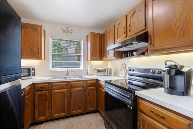 Beautifully maintained private corner unit w/gorgeous views of on Vero Beach South Golf Course in Florida - for sale on GolfHomes.com, golf home, golf lot