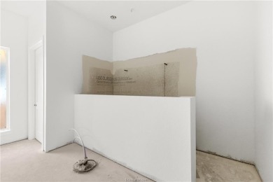 This majestic 4 bedroom, 3 full bath, 3010 square foot stunner on The Traditions Club At Texas A and M in Texas - for sale on GolfHomes.com, golf home, golf lot