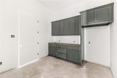 This majestic 4 bedroom, 3 full bath, 3010 square foot stunner on The Traditions Club At Texas A and M in Texas - for sale on GolfHomes.com, golf home, golf lot