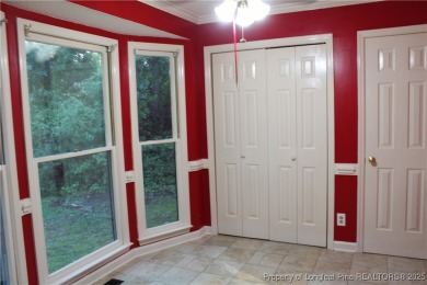 Welcome to this 2-bedroom, 2-bathroom townhome located right on on Kings Grant Golf and Country Club in North Carolina - for sale on GolfHomes.com, golf home, golf lot