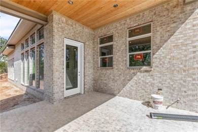 This majestic 4 bedroom, 3 full bath, 3010 square foot stunner on The Traditions Club At Texas A and M in Texas - for sale on GolfHomes.com, golf home, golf lot