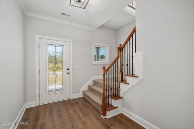 Discover coastal living at this new construction beauty in The on North River Club in North Carolina - for sale on GolfHomes.com, golf home, golf lot