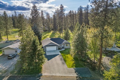 This charming two bedroom two bath home was built in 2009 and is on Chewelah Golf and Country Club  in Washington - for sale on GolfHomes.com, golf home, golf lot