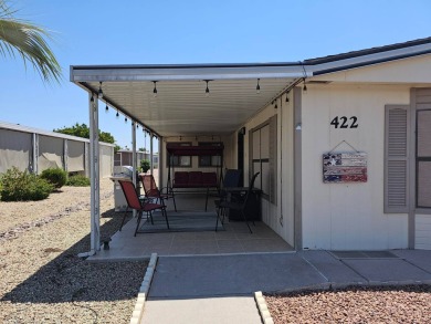 This lovely home features charming beach-themed decor with on Painted Mountain Golf Club in Arizona - for sale on GolfHomes.com, golf home, golf lot