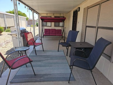 This lovely home features charming beach-themed decor with on Painted Mountain Golf Club in Arizona - for sale on GolfHomes.com, golf home, golf lot