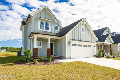 Discover coastal living at this new construction beauty in The on North River Club in North Carolina - for sale on GolfHomes.com, golf home, golf lot