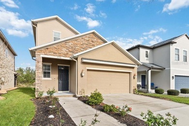 Welcome to this stunning 5-bedroom, 3.5-bath home with a on Harmony Golf Preserve in Florida - for sale on GolfHomes.com, golf home, golf lot