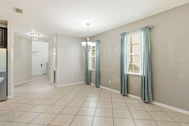 Welcome to this stunning 5-bedroom, 3.5-bath home with a on Harmony Golf Preserve in Florida - for sale on GolfHomes.com, golf home, golf lot