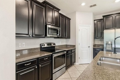 Welcome to this stunning 5-bedroom, 3.5-bath home with a on Harmony Golf Preserve in Florida - for sale on GolfHomes.com, golf home, golf lot