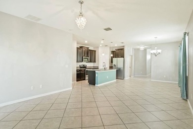 Welcome to this stunning 5-bedroom, 3.5-bath home with a on Harmony Golf Preserve in Florida - for sale on GolfHomes.com, golf home, golf lot