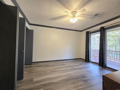 Welcome to this beautifully updated and fully furnished on DeSoto Golf Course in Arkansas - for sale on GolfHomes.com, golf home, golf lot