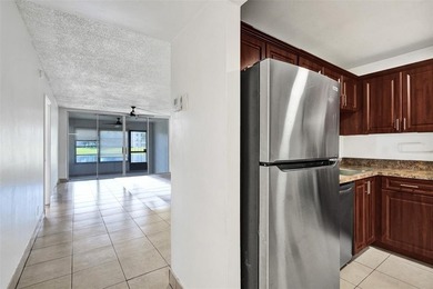 Spacious 2-Bedroom, 2-Bath Condo with Lake Views in Pine Island on Pine Island Ridge Country Club in Florida - for sale on GolfHomes.com, golf home, golf lot