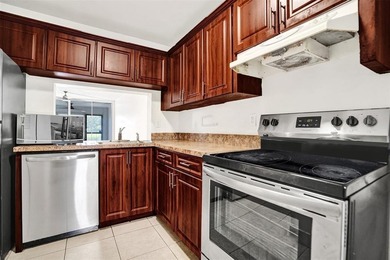 Spacious 2-Bedroom, 2-Bath Condo with Lake Views in Pine Island on Pine Island Ridge Country Club in Florida - for sale on GolfHomes.com, golf home, golf lot