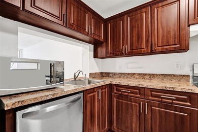 Spacious 2-Bedroom, 2-Bath Condo with Lake Views in Pine Island on Pine Island Ridge Country Club in Florida - for sale on GolfHomes.com, golf home, golf lot