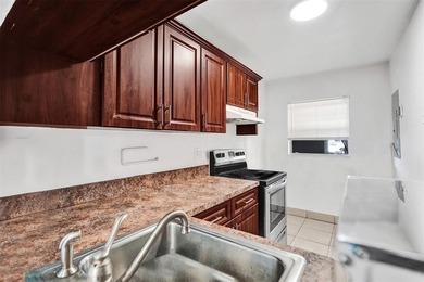 Spacious 2-Bedroom, 2-Bath Condo with Lake Views in Pine Island on Pine Island Ridge Country Club in Florida - for sale on GolfHomes.com, golf home, golf lot